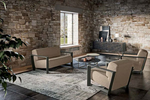 Arco Upholstered Armchair In Beige With Matching Sofa In Living Area Setting