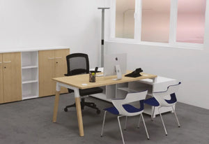 Buronomic Dialogue Natural Shared Desk In Oak Top Finish With Black Armchair And Wooden Bookcase