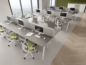 Key Bench Desks with Light Desk Screens in Light Grey Finish with Galen Office Chairs and Uno Lockers with Planters in Modern Office Setting 2