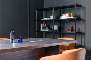 Mito Wooden Executive Desk with Tub Chair with Bookshelf in Executive Setting