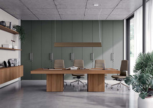 T45 Rectangular Shaped Meeting Room Table with Cube Legs in Walnut Finish Ergonomic Chair in Meeting Room Setting