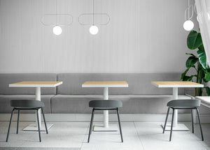 Team Polypropylene Ergonomic Low Stool with Canteen Table and Modular Sofa in Canteen Setting