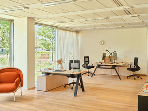 Viga Executive Bench Desk with Storage with Task Chair and Lounge Chair in Modern Office Setting