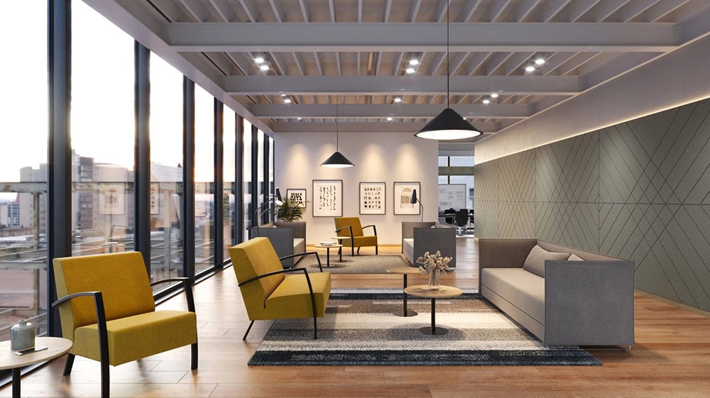 Age Armchair with Grey Modular Sofa and Round Top Coffee Table in Breakout Area