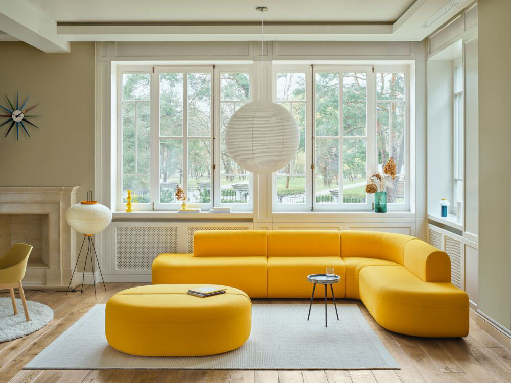 Artiko Upholstered Modular Seating With Floor Rug And Vase In Living Room Setting