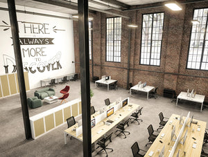 Astrolite Shared Desk in open space including an informal work space composed of coffee table