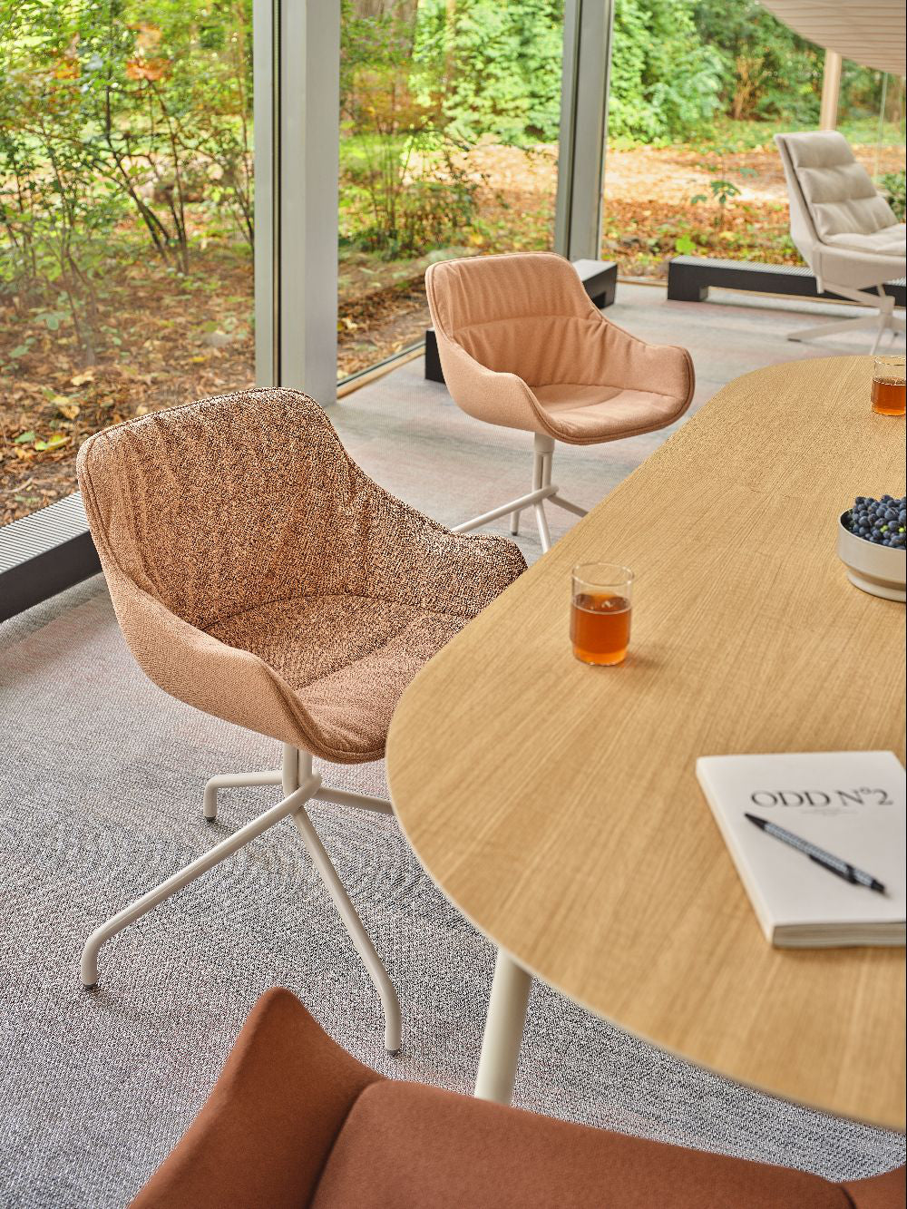 Baltic Soft Duo Armchair with Wooden Table and Lounge Chair in Modern Office Setting