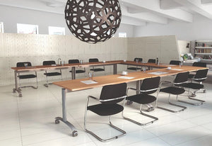 Buronomic Solution Fliptop Table In Grey Leg Finish With Black Armchair And White Bookshelves In Meeting Room