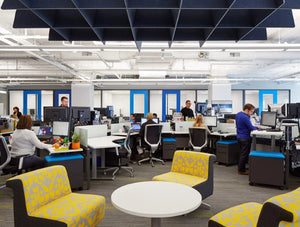 BuzziGrid Sound Absorbing Panel with Yellow Chair and Round Table in Office Setting