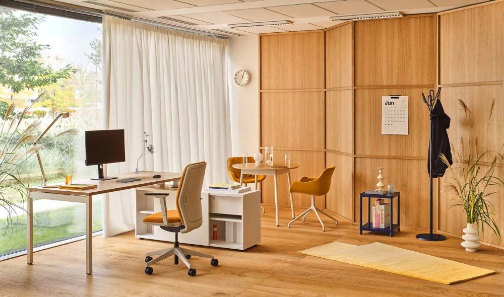 Clip Steel Coat Stand in Black Finish with Round Oak Top Table and Light Brown Armchair in Modern Executive Office Setting