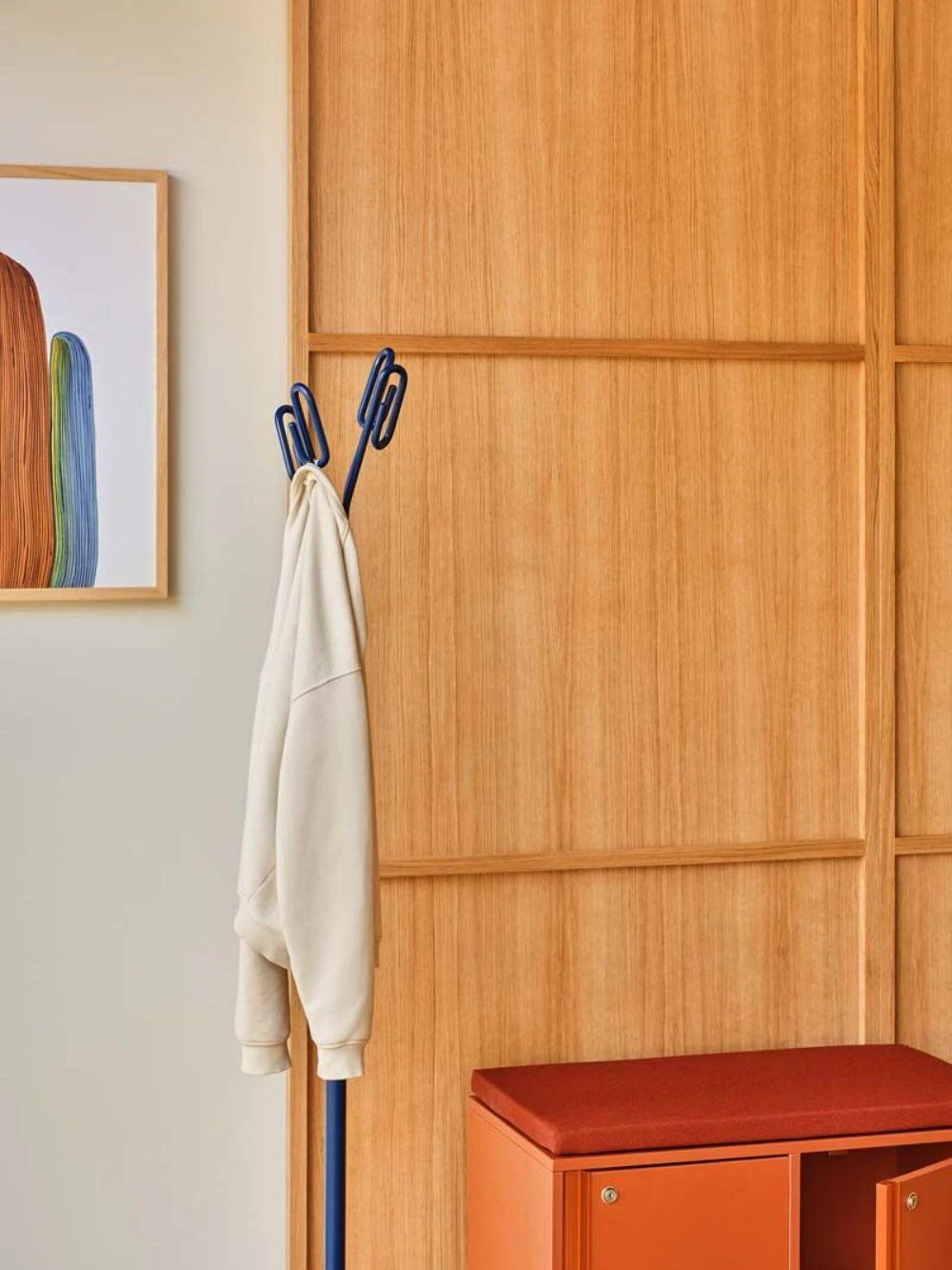 Clip Steel Coat Stand in Blue Finish with Orange Storage Locker and Red Cushion