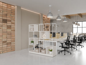 Ionic Cube 2x Double Grid Zoning System in White with Key Bench Desk with Straight Legs in White and Yellow Light Desk Screen and Aria Ergonomic Chair in Modern Office Setting