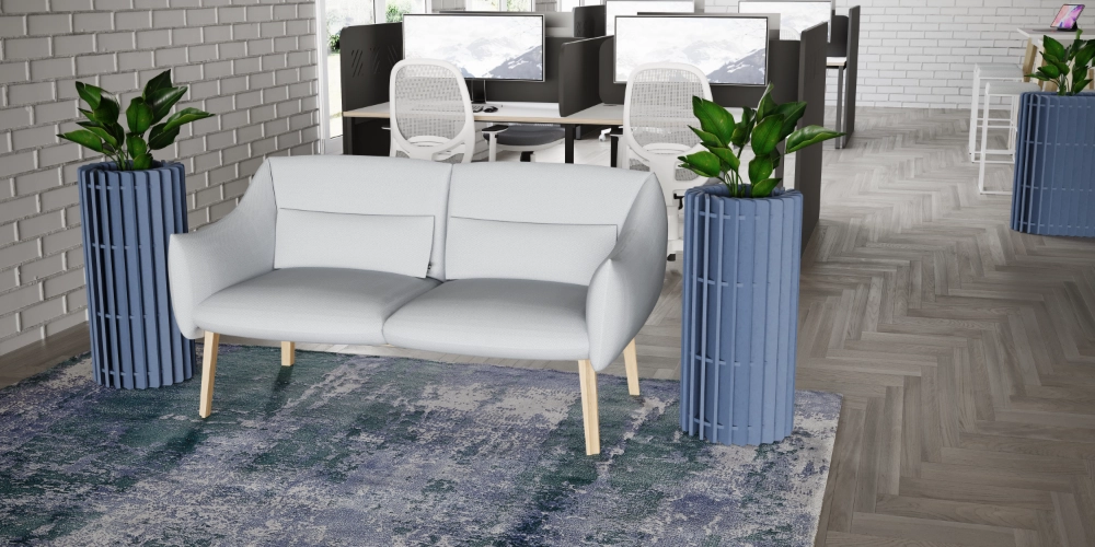 Koala Small Acoustic Planter in Blue Finish with Light Grey Sofa and White Top Bench Desk in Modern Office Setting