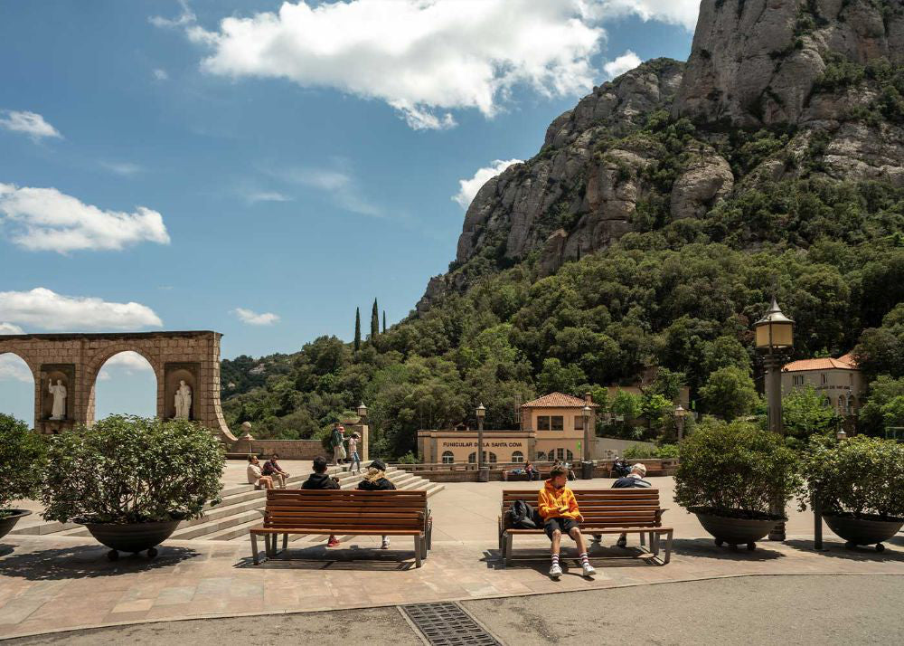 Leman Wooden Bench with Backrest in an Open Area