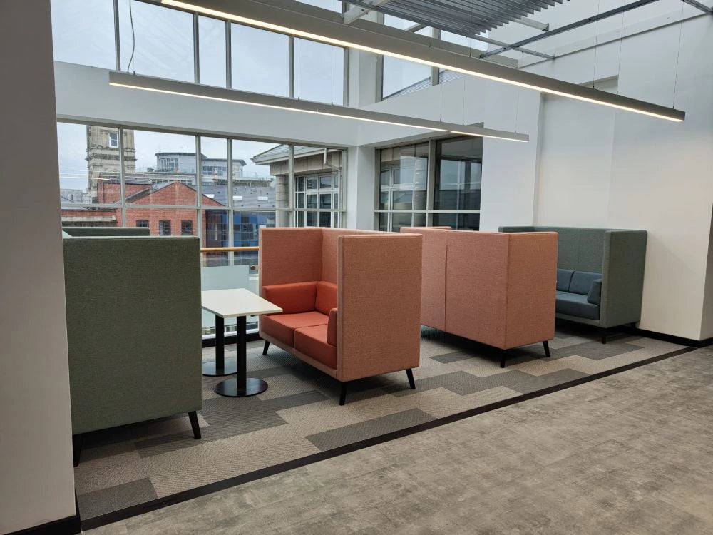 Lenny 2 Seater High Back Chair in Different Finishes with White Top Tables in Modern Lounge Setting