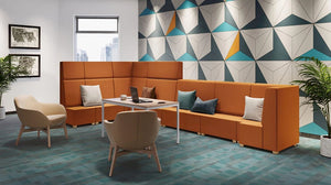 Loop Upholstered Lounge Armchair In Light Brown Finish With Orange Modular Sofa With Wooden Top Straight Table In Breakout Setting