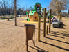 Minsk Outdoor Waste Bin in Brown Finish Outdoor Setting 2