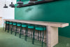 Momo High Stool with Footrest in Reception Setting