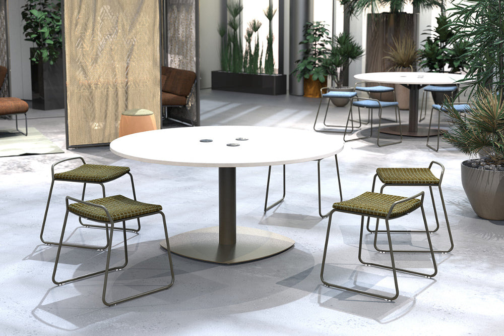 Mono Giant Round Meeting Room Table With Power And Indoor Plant In Breakout Setting
