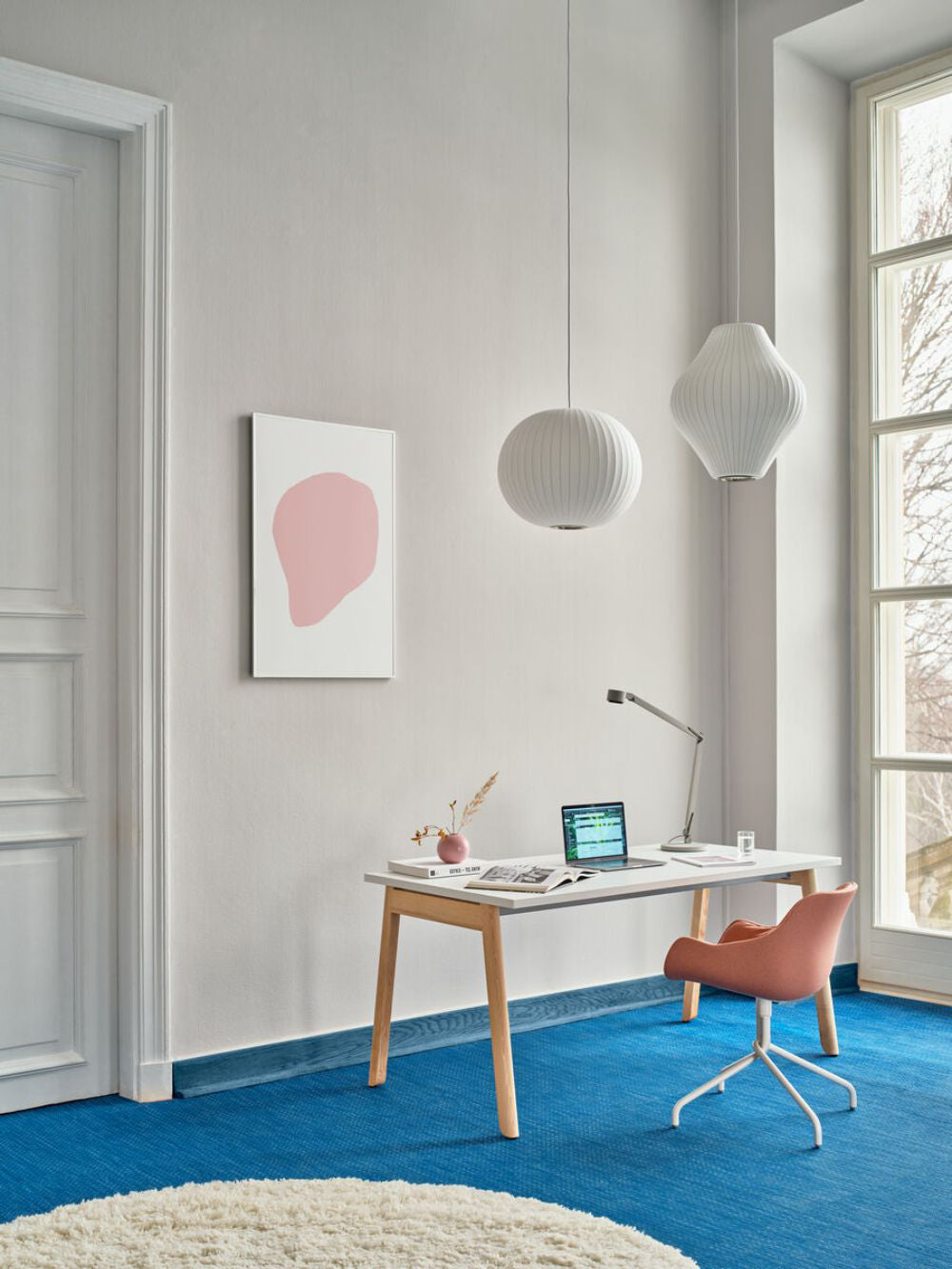 Ogi B Wooden Straight Desk With Tub Chair And Ceiling Light In Office Setting