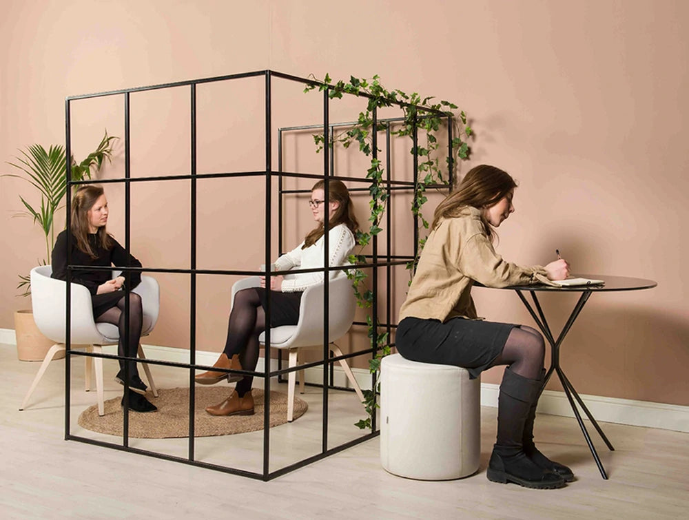 Palisades Metal Grid Zoning Separation Space With Lounge Chair Round Table And Pouffe