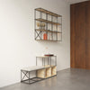 Saar Modules Metal Shelving Unit Hanged in the Wall of the Living Room