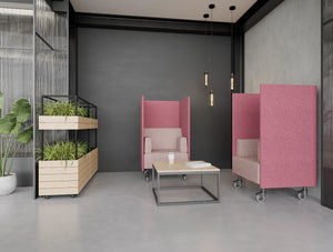 Snug Mobile Armchair with High Back in Pink Finish with Oasis 2 Level Mobile Planter in Lounge Area