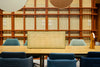 Sund L Wooden Meeting Room Table with Desk Screen and Chairs in Modern Office Setting