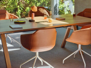 Ultra Office Chair with Wooden Table in Modern Office Setting